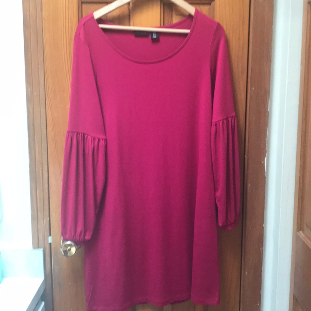 Cute bright pink tunic dress with sleeve detail.